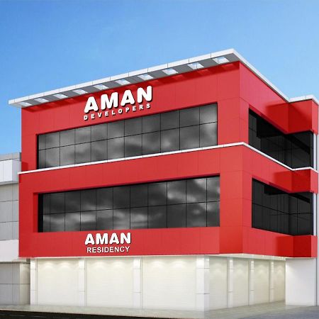 Готель Aman Residency Thodupuzha Екстер'єр фото