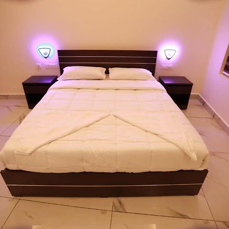 Готель Aman Residency Thodupuzha Екстер'єр фото