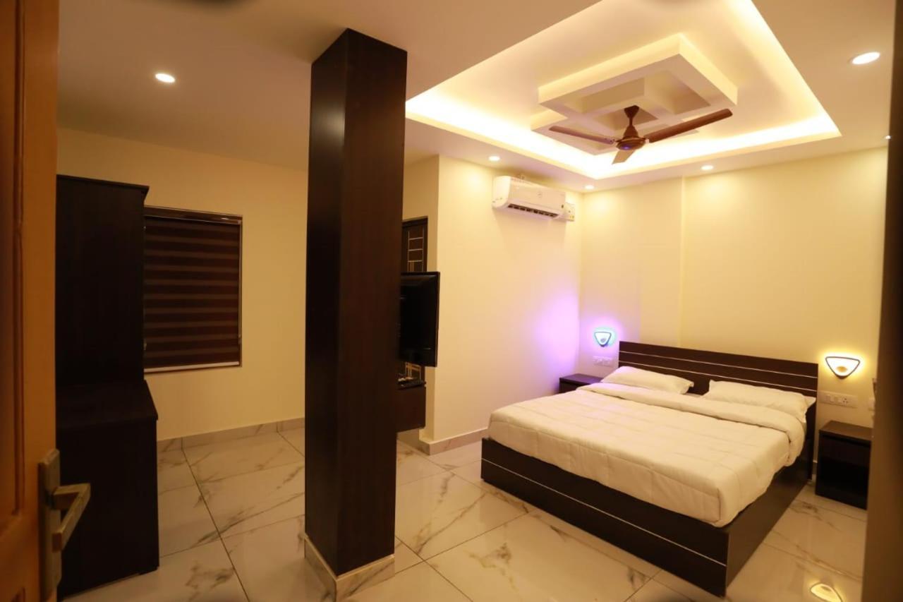 Готель Aman Residency Thodupuzha Екстер'єр фото